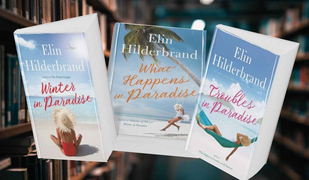 Stacked copies of Winter in Paradise, What Happens in Paradise, and Troubles in Paradise by Elin Hilderbrand displayed against bookshelves